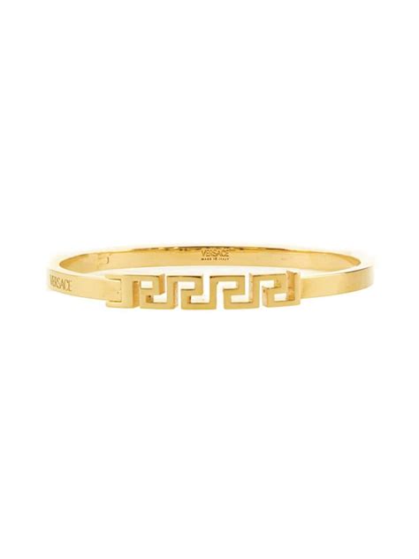 versace greca goldtone bangle.